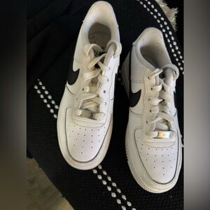 Nike Air Force ones withh black swoosh